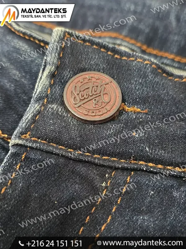 bouton métallique patiné, bouton jeans denim, bouton rond métal, bouton vintage denim, couture jeans, mercerie professionnelle, accessoires couture