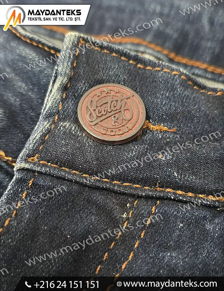 bouton métallique patiné, bouton jeans denim, bouton rond métal, bouton vintage denim, couture jeans, mercerie professionnelle, accessoires couture